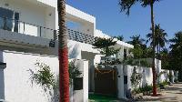 The two houses as seen as you approach them. They are identical in their spaces and specifications including the colour of the tiles in the bathrooms.